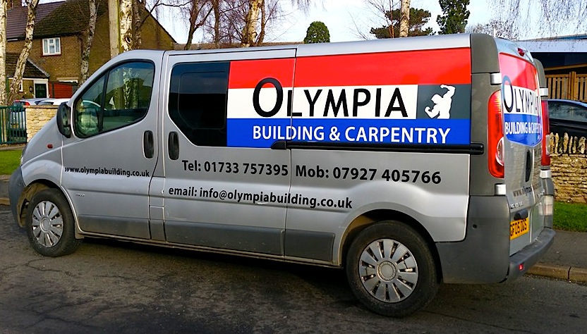 Picture van with  company graphics wrapping. Red, white and blue, colourful